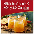Spiced apple cider drink mix served in glasses with apples and cinnamon, rich in Vitamin C and only 80 calories per serving.