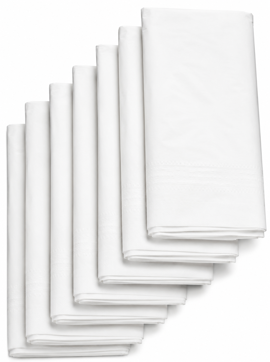 Seven white disposable plastic table covers for events stacked together, ideal for parties and gatherings.