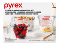 Pyrex Glass Measuring Cup Set 3-Piece showing 1-cup, 2-cup, and 4-cup sizes with mixed ingredients.