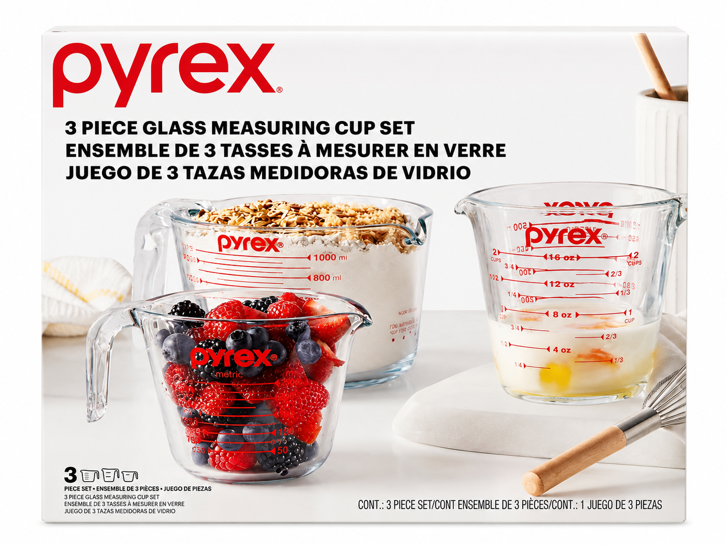 Pyrex Glass Measuring Cup Set 3-Piece showing 1-cup, 2-cup, and 4-cup sizes with mixed ingredients.