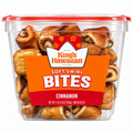 King's Hawaiian Cinnamon Soft Swirl Bites in a clear container, showcasing delicious doughy bites with sweet cinnamon swirls.