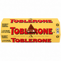 Toblerone Milk Chocolate Bars Honey & Almond Nougat 6-Pack with distinctive packaging and chocolate pieces.