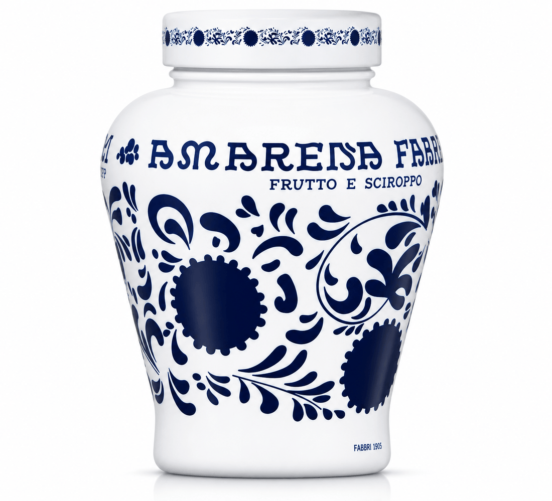 Fabbri Amarena cherries in syrup jar, showcasing elegant design and branding.