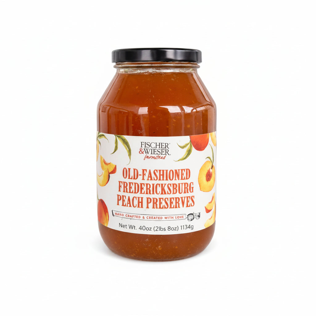Old-fashioned Fredericksburg Peach Preserves 40oz jar by Fischer & Wieser showcasing rich peach flavor.