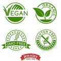 Vegan, Organic, GMO Free, and Gluten Free certification badges by Jennies for organic coconut cacao chocolate bites.